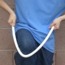 Bend the cold PVC or Conduit over Knee or Pipe Bender